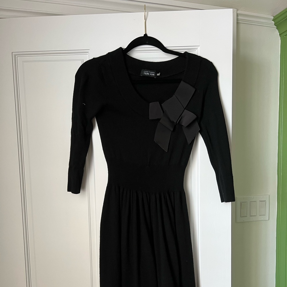 Black sweater dress with bow